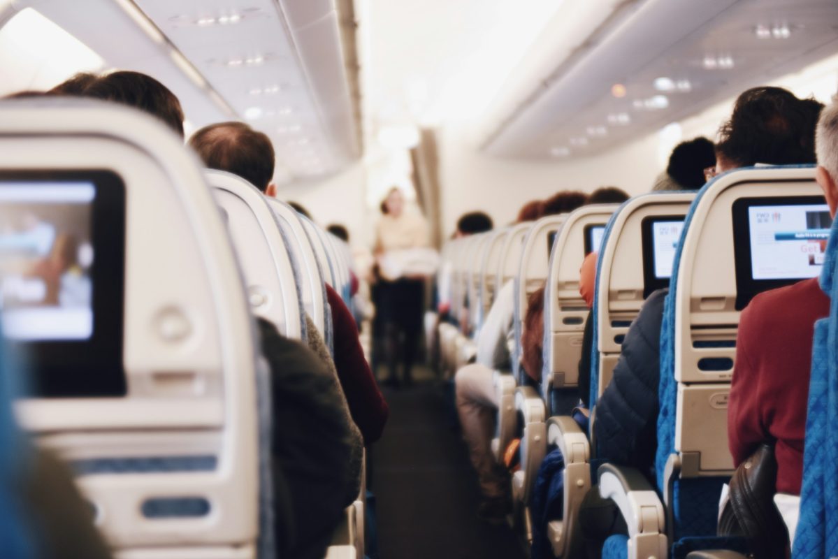 Passagers dans un avion de la compagnie Singapour Airlines